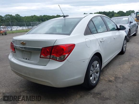 ✅ 2016 Chevrolet Cruze LS • VIN: 1G1PB5SGXG7173440 • Lot: 42995735. Listed on IAAI with 122,550 mi. Free auction sales archive from the USA and detailed vehicle history report at DreamBid. Image 4.