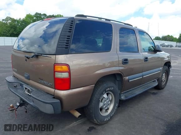 ✅ 2003 Chevrolet Tahoe LT • VIN: 1GNEC13Z43R161990 • Lot: 42242612. Listed on IAAI with 236,997 mi. Free auction sales archive from the USA and detailed vehicle history report at DreamBid. Image 4.