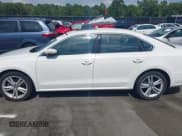 ✅ 2014 Volkswagen Passat SE • VIN: 1VWBS7A35EC088504 • Лот: 42312048. Опубликован ранее на IAAI с пробегом 98 057 миль. Бесплатный доступ к архиву аукционных продаж из США и подробный отчёт об истории автомобиля на DreamBid. Изображение 14.