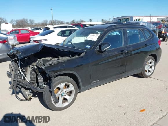 ✅ 2015 BMW X1 sDrive28i • VIN: WBAVM1C58FV498559 • Lot: 41208638. Listed on IAAI with 100,452 mi. Free auction sales archive from the USA and detailed vehicle history report at DreamBid. Image 17.