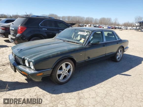 ✅ 1998 Jaguar XJ • VIN: SAJPX1846WC846083 • Lot: 45659035. Listed on Copart with 87,447 mi. Free auction sales archive from the USA and detailed vehicle history report at DreamBid. Image 1.