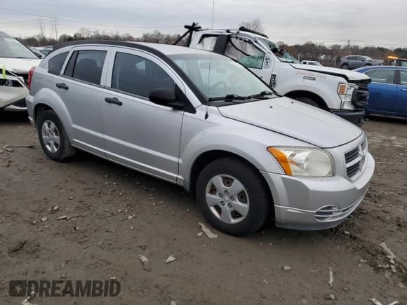 ✅ 2010 Dodge Caliber • VIN: 1B3CB1HA8AD587747 • Лот: 83140504. Опубликован ранее на Copart с пробегом 174 208 миль. Бесплатный доступ к архиву аукционных продаж из США и подробный отчёт об истории автомобиля на DreamBid. Изображение 4.
