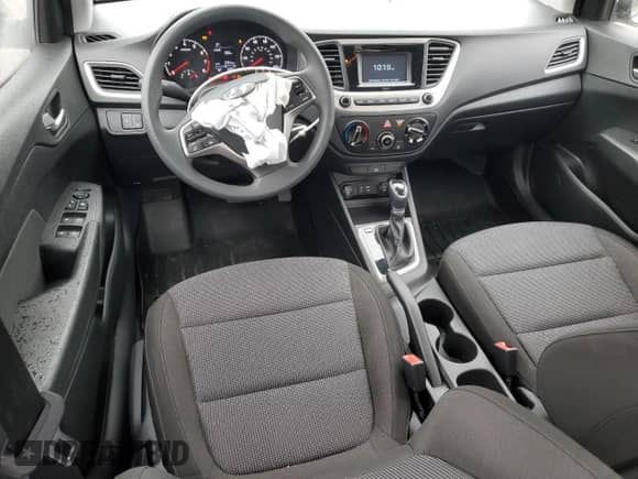 2022 Hyundai Accent SE с VIN 3KPC24A67NE167729, выставлен на аукционе Copart как лот 82783215 с пробегом 19 905 миль миль и Списание • Salvage title. История ставок и продаж доступна на DreamBid. Изображение 8.