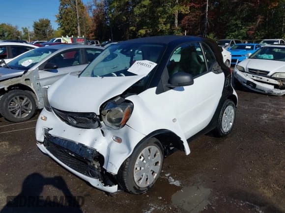✅ 2016 Smart fortwo Prime • VIN: WMEFJ5DA7GK056573 • Lot: 43483333. Listed on IAAI with 122,945 mi. Free auction sales archive from the USA and detailed vehicle history report at DreamBid. Image 17.