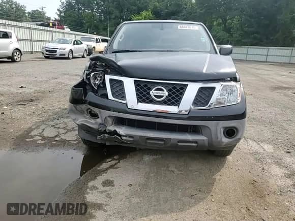2015 Nissan Frontier S z VIN 1N6BD0CT6FN747906, wystawiony jako Copart lot #66949015 z przebiegiem Nie podano mil oraz Szkoda całkowita • Salvage title. Historia ofert i sprzedaży dostępna na DreamBid. Obrazek 13.