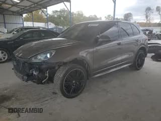 ✅ 2016 Porsche Cayenne • VIN: WP1AA2A20GLA10337 • Lot: 90691655. Listed on Copart with 115,599 mi. Free auction sales archive from the USA and detailed vehicle history report at DreamBid. Image 1.