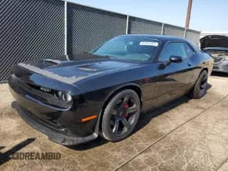 2013 Dodge Challenger SRT-8 с VIN 2C3CDYCJ9DH669328, выставлен на аукционе Copart как лот 81054405 с пробегом 76 277 миль миль и Списание • Salvage title. История ставок и продаж доступна на DreamBid. Изображение 1.