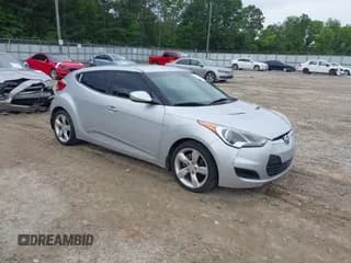 ✅ 2012 Hyundai Veloster w/Gray Int • VIN: KMHTC6AD5CU036042 • Lot: 42423678. Listed on IAAI with 132,909 mi. Free auction sales archive from the USA and detailed vehicle history report at DreamBid. Image 1.