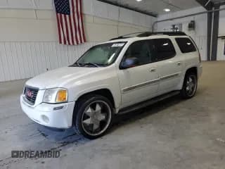 ✅ 2003 GMC Envoy SLT • VIN: 1GKES16S436240107 • Lot: 52327005. Listed on Copart with 237,745 mi. Free auction sales archive from the USA and detailed vehicle history report at DreamBid. Image 1.
