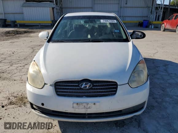 2006 Hyundai Accent GLS z VIN KMHCN46C36U009585, wystawiony jako Copart lot #74067284 z przebiegiem 140 696 mil mil oraz Nie do naprawy • Non repairable. Historia ofert i sprzedaży dostępna na DreamBid. Obrazek 5.
