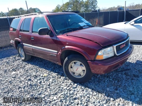 ✅ 2001 GMC Jimmy SLE • VIN: 1GKCS13W012143344 • Lot: 41385552. Wystawiony na IAAI z przebiegiem 216 127 mil. Bezpłatny archiwum sprzedaży aukcyjnych z USA i szczegółowy raport historii pojazdu na DreamBid. Zdjęcie 1.