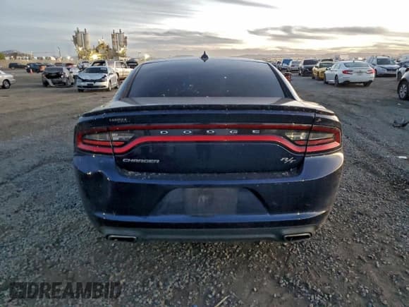 ✅ 2015 Dodge Charger RT • VIN: 2C3CDXCT5FH838825 • Lot: 94729745. Listed on Copart with 139,958 mi. Free auction sales archive from the USA and detailed vehicle history report at DreamBid. Image 6.
