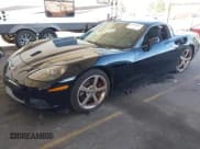 ✅ 2009 Chevrolet Corvette 1LT • VIN: 1G1YY25W595109776 • Lot: 43795657. Listed on IAAI with 91,653 mi. Free auction sales archive from the USA and detailed vehicle history report at DreamBid. Image 2.
