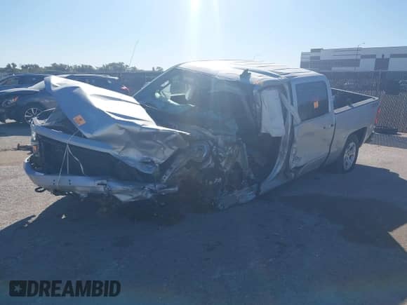 2017 Chevrolet Silverado 1500 LT with VIN 3GCUKREC4HG504058, listed as a IAAI auction lot 43038017 with Not provided miles and . Bid and sale history available at DreamBid. Image 2.