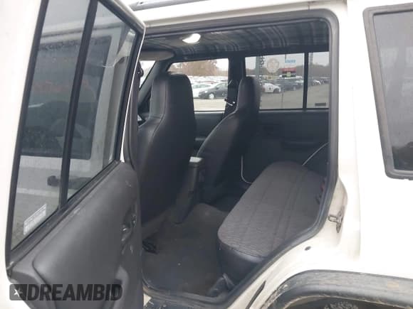 ✅ 2001 Jeep Cherokee Sport • VIN: 1J4FF48S11L583100 • Lot: 43576007. Listed on IAAI with 183,638 mi. Free auction sales archive from the USA and detailed vehicle history report at DreamBid. Image 8.