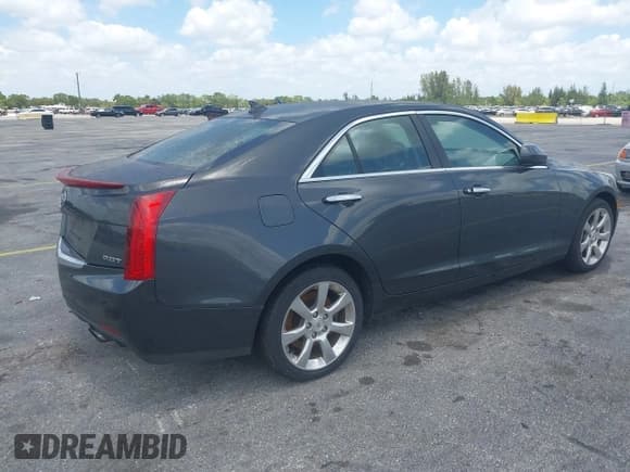 ✅ 2014 Cadillac ATS Standard AWD • VIN: 1G6AG5RX9E0173779 • Lot: 42172080. Listed on IAAI with 102,293 mi. Free auction sales archive from the USA and detailed vehicle history report at DreamBid. Image 4.