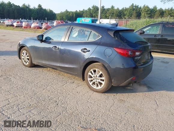 ✅ 2014 Mazda 3 i Grand Touring • VIN: JM1BM1M77E1213121 • Lot: 42971514. Listed on IAAI with 73,225 mi. Free auction sales archive from the USA and detailed vehicle history report at DreamBid. Image 3.