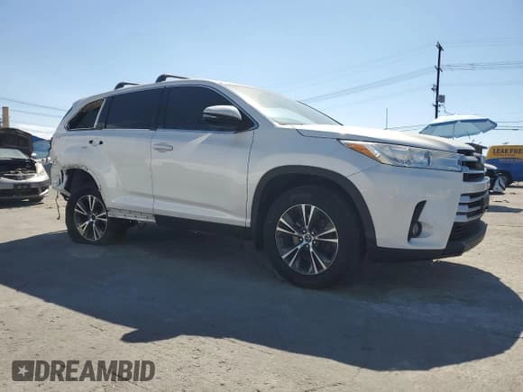 ✅ 2019 Toyota Highlander LE • VIN: 5TDZZRFH9KS353271 • Lot: 86115325. Listed on Copart with 58,874 mi. Free auction sales archive from the USA and detailed vehicle history report at DreamBid. Image 4.