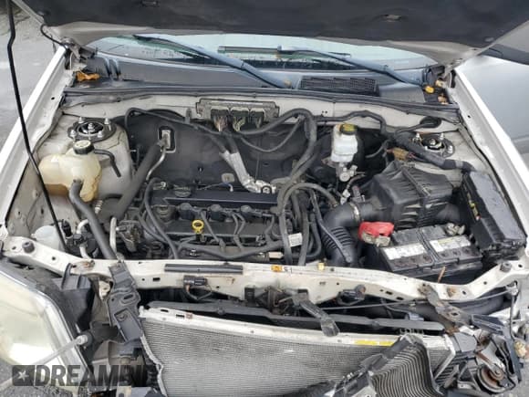 ✅ 2009 Mercury Mariner • VIN: 4M2CU91729KJ15969 • Lot: 86498475. Wystawiony na Copart z przebiegiem 162 788 mil. Bezpłatny archiwum sprzedaży aukcyjnych z USA i szczegółowy raport historii pojazdu na DreamBid. Zdjęcie 12.