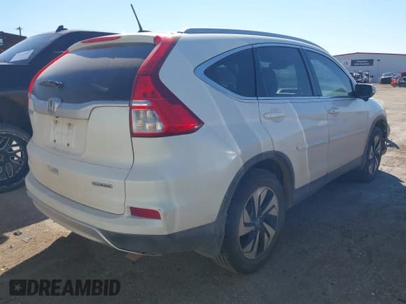 ✅ 2015 Honda CR-V Touring • VIN: 5J6RM3H94FL021628 • Лот: 43392393. Опубликован ранее на IAAI с пробегом 193 399 миль. Бесплатный доступ к архиву аукционных продаж из США и подробный отчёт об истории автомобиля на DreamBid. Изображение 4.