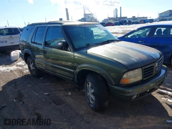 ✅ 2001 Oldsmobile Bravada • VIN: 1GHDT13W312184767 • Lot: 41347993. Listed on IAAI with 130,306 mi. Free auction sales archive from the USA and detailed vehicle history report at DreamBid. Image 1.