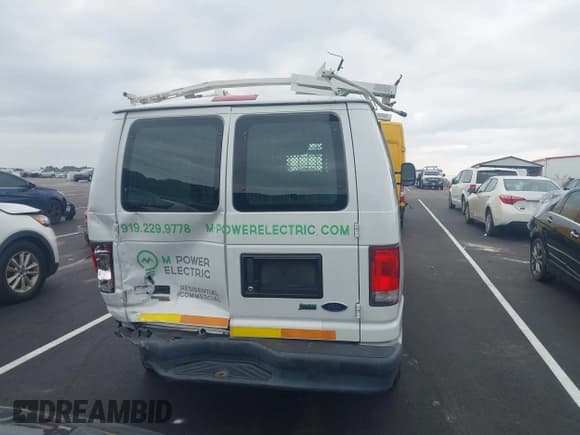 ✅ 2014 Ford Econoline Cargo Commercial • VIN: 1FTNE2EWXEDA84022 • Lot: 42886331. Listed on IAAI with 131,357 mi. Free auction sales archive from the USA and detailed vehicle history report at DreamBid. Image 16.