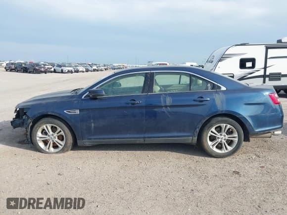 ✅ 2017 Ford Taurus SEL • VIN: 1FAHP2E82HG129455 • Lot: 42052522. Listed on IAAI with 119,339 mi. Free auction sales archive from the USA and detailed vehicle history report at DreamBid. Image 15.