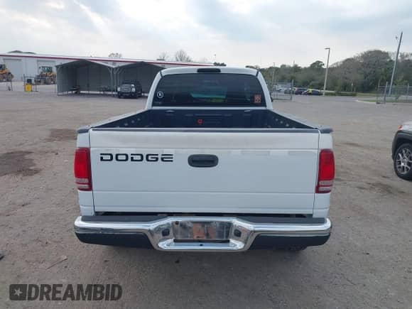 2002 Dodge Dakota Sport z VIN 1B7GL32X22S508401, wystawiony jako IAAI lot #41591465 z przebiegiem Nie podano mil oraz . Historia ofert i sprzedaży dostępna na DreamBid. Obrazek 16.