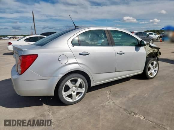 2014 Chevrolet Sonic LTZ с VIN 1G1JE5SG0E4121570, выставлен на аукционе Copart как лот 81662605 с пробегом 121 861 миль миль и Списание • Salvage title. История ставок и продаж доступна на DreamBid. Изображение 3.