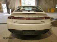 ✅ 2015 Lincoln MKZ • VIN: 3LN6L2J92FR607094 • Lot: 82484395. Wystawiony na Copart z przebiegiem 120 430 mil. Bezpłatny archiwum sprzedaży aukcyjnych z USA i szczegółowy raport historii pojazdu na DreamBid. Zdjęcie 6.