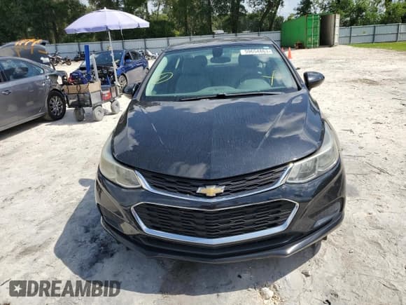 ✅ 2017 Chevrolet Cruze LS • VIN: 1G1BC5SM2H7109343 • Lot: 59654863. Listed on Copart with 97,882 mi. Free auction sales archive from the USA and detailed vehicle history report at DreamBid. Image 5.
