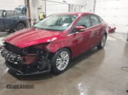 ✅ 2017 Ford Focus Titanium • VIN: 1FADP3J26HL238966 • Lot: 43818466. Listed on IAAI with 35,572 mi. Free auction sales archive from the USA and detailed vehicle history report at DreamBid. Image 2.