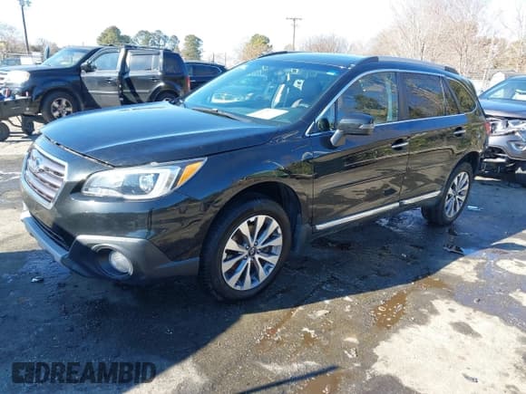 ✅ 2017 Subaru Outback Touring • VIN: 4S4BSETC6H3399587 • Lot: 41225790. Listed on IAAI with 89,228 mi. Free auction sales archive from the USA and detailed vehicle history report at DreamBid. Image 2.