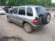 ✅ 2002 Kia Sportage • VIN: KNDJA723525157580 • Lot: 42409156. Listed on IAAI with 159,322 mi. Free auction sales archive from the USA and detailed vehicle history report at DreamBid. Image 3.