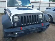 ✅ 2017 Jeep Wrangler Unlimited Rubicon Recon • VIN: 1C4BJWFG1HL693572 • Lot: 42601855. Listed on IAAI with 64,342 mi. Free auction sales archive from the USA and detailed vehicle history report at DreamBid. Image 12.