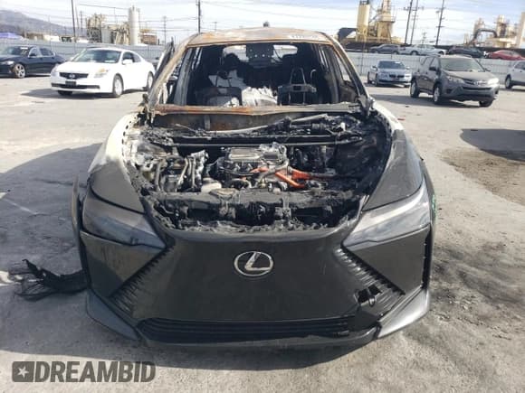 ✅ 2024 Lexus RZ 300e Premium • VIN: JTJABABB0RA004671 • Лот: 57287935. Опубликован ранее на Copart с пробегом Не указан. Бесплатный доступ к архиву аукционных продаж из США и подробный отчёт об истории автомобиля на DreamBid. Изображение 5.