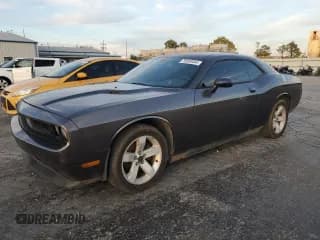 ✅ 2013 Dodge Challenger SXT • VIN: 2C3CDYAG1DH680654 • Lot: 79269494. Wystawiony na Copart z przebiegiem 145 371 mil. Bezpłatny archiwum sprzedaży aukcyjnych z USA i szczegółowy raport historii pojazdu na DreamBid. Zdjęcie 1.