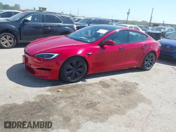 ✅ 2022 Tesla Model S • VIN: 5YJSA1E55NF491593 • Lot: 42223771. Listed on IAAI with 58,875 mi. Free auction sales archive from the USA and detailed vehicle history report at DreamBid. Image 2.