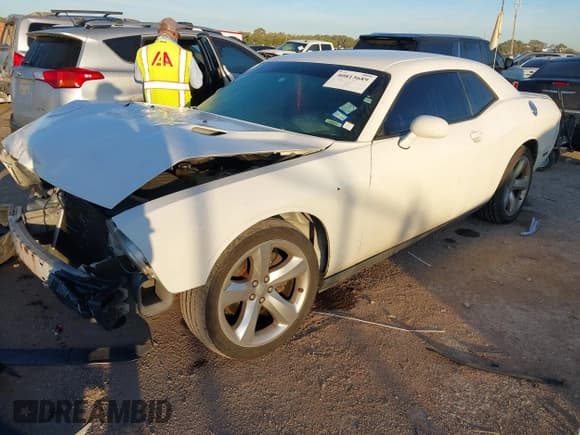 ✅ 2013 Dodge Challenger Rallye Redline • VIN: 2C3CDYAG2DH605817 • Lot: 40813689. Wystawiony na IAAI z przebiegiem 210 112 mil. Bezpłatny archiwum sprzedaży aukcyjnych z USA i szczegółowy raport historii pojazdu na DreamBid. Zdjęcie 2.