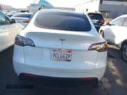 ✅ 2022 Tesla Model Y Long Range • VIN: 7SAYGDEE0NF506224 • Lot: 43551820. Listed on IAAI with 33,368 mi. Free auction sales archive from the USA and detailed vehicle history report at DreamBid. Image 17.
