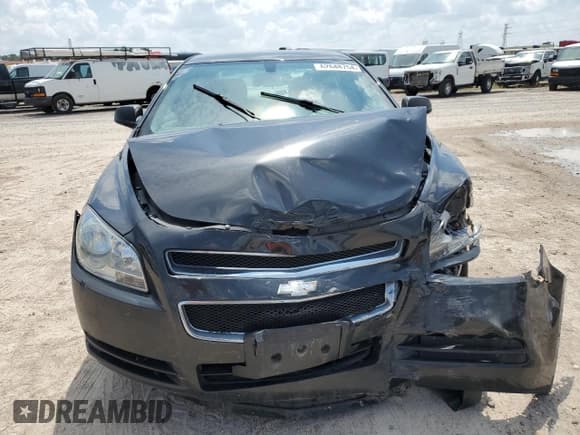 ✅ 2011 Chevrolet Malibu 1LS • VIN: 1G1ZB5E12BF112629 • Lot: 62648754. Listed on Copart with 43,576 mi. Free auction sales archive from the USA and detailed vehicle history report at DreamBid. Image 5.