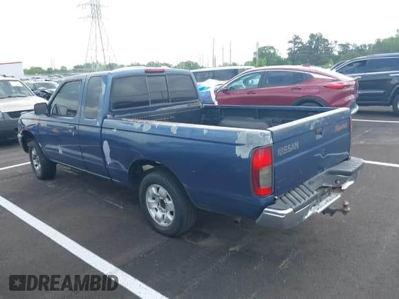 ✅ 2000 Nissan Frontier XE • VIN: 1N6DD26S0YC374917 • Lot: 42148189. Listed on IAAI with 150,356 mi. Free auction sales archive from the USA and detailed vehicle history report at DreamBid. Image 3.