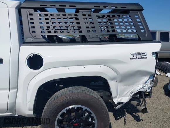 ✅ 2024 Toyota Tacoma TRD Sport Hybrid • VIN: 3TYLC5LN3RT001392 • Lot: 42401518. Listed on IAAI with 3,310 mi. Free auction sales archive from the USA and detailed vehicle history report at DreamBid. Image 18.