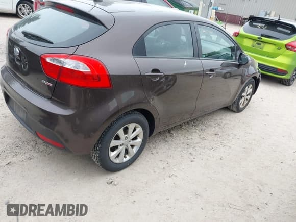 ✅ 2013 Kia Rio SX • VIN: KNADN5A37D6151331 • Lot: 42348350. Listed on IAAI with 106,140 mi. Free auction sales archive from the USA and detailed vehicle history report at DreamBid. Image 4.