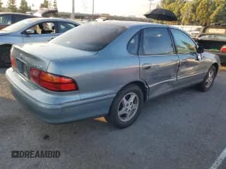 ✅ 1999 Toyota Avalon XL • VIN: 4T1BF18BXXU352438 • Лот: 80347264. Опубликован ранее на Copart с пробегом 168 872 миль. Бесплатный доступ к архиву аукционных продаж из США и подробный отчёт об истории автомобиля на DreamBid. Изображение 3.