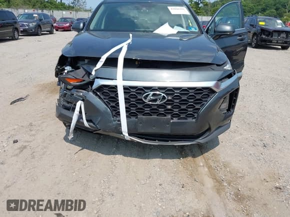 ✅ 2020 Hyundai Santa Fe SEL • VIN: 5NMS3CAD7LH231730 • Лот: 42846182. Опубликован ранее на IAAI с пробегом 104 174 миль. Бесплатный доступ к архиву аукционных продаж из США и подробный отчёт об истории автомобиля на DreamBid. Изображение 6.