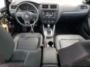 ✅ 2013 Volkswagen Jetta SEL • VIN: 3VWLX7AJ2DM390303 • Lot: 82393335. Listed on Copart with 52,446 mi. Free auction sales archive from the USA and detailed vehicle history report at DreamBid. Image 8.