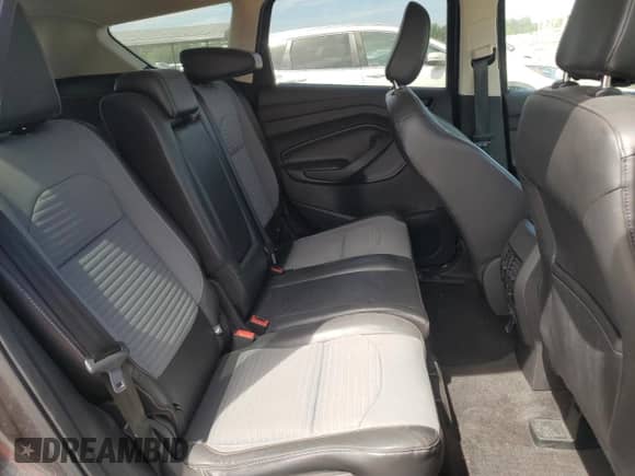 2018 Ford Escape SE z VIN 1FMCU9GD6JUD48647, wystawiony jako Copart lot #70868345 z przebiegiem 102 072 mil mil oraz Szkoda całkowita • Salvage title. Historia ofert i sprzedaży dostępna na DreamBid. Obrazek 11.