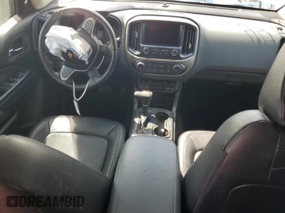 ✅ 2018 Chevrolet Colorado 4WD Z71 • VIN: 1GCGTDENXJ1306345 • Лот: 43760073. Опубликован ранее на Copart с пробегом 60 051 миль. Бесплатный доступ к архиву аукционных продаж из США и подробный отчёт об истории автомобиля на DreamBid. Изображение 8.