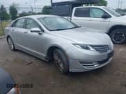 ✅ 2013 Lincoln MKZ • VIN: 3LN6L2J91DR800981 • Lot: 42428215. Wystawiony na IAAI z przebiegiem 106 813 mil. Bezpłatny archiwum sprzedaży aukcyjnych z USA i szczegółowy raport historii pojazdu na DreamBid. Zdjęcie 1.